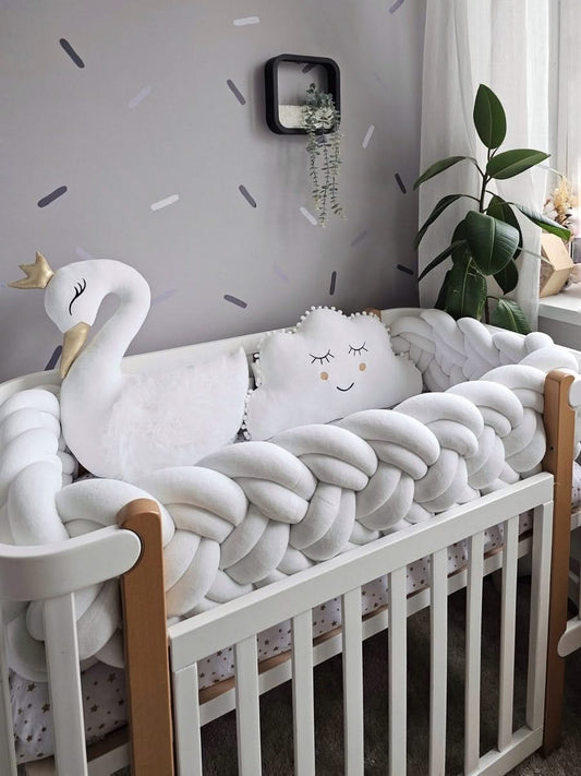 Premium creamy baby crib bedding set with braided crib bumper. KARI studio
