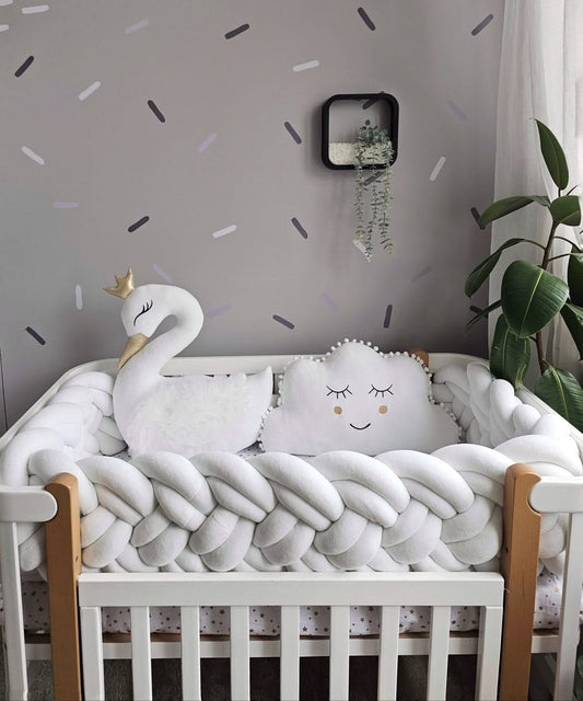 Premium creamy baby crib bedding set with braided crib bumper. KARI studio