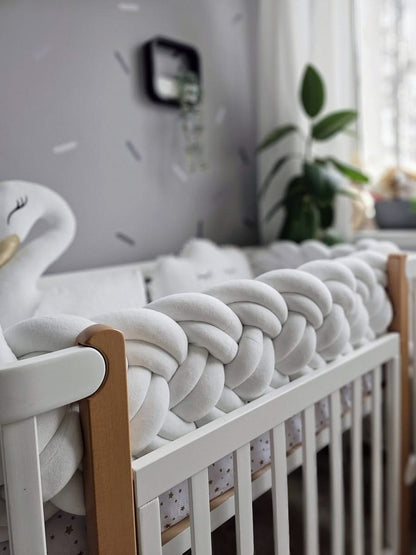 Premium creamy baby crib bedding set with braided crib bumper. KARI studio