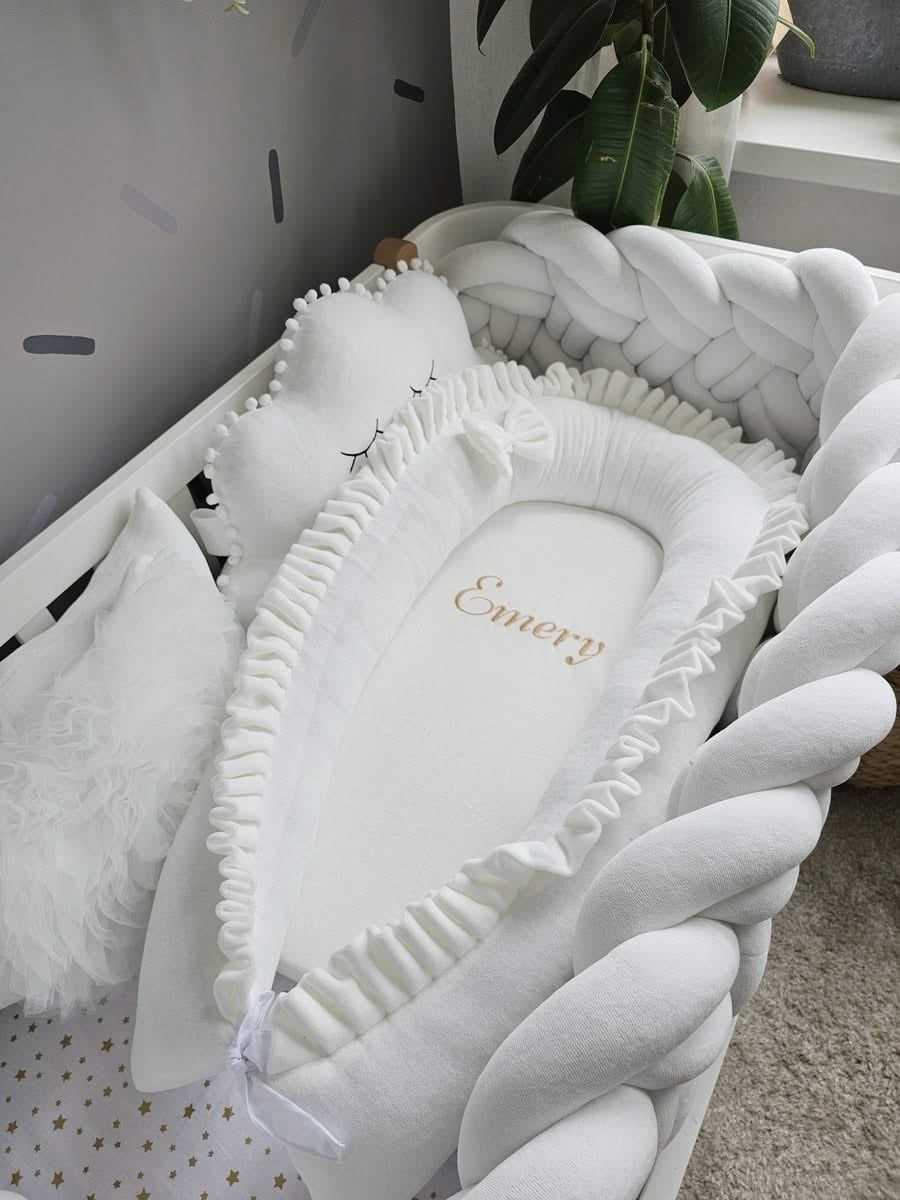 Premium creamy baby crib bedding set with braided crib bumper. KARI studio