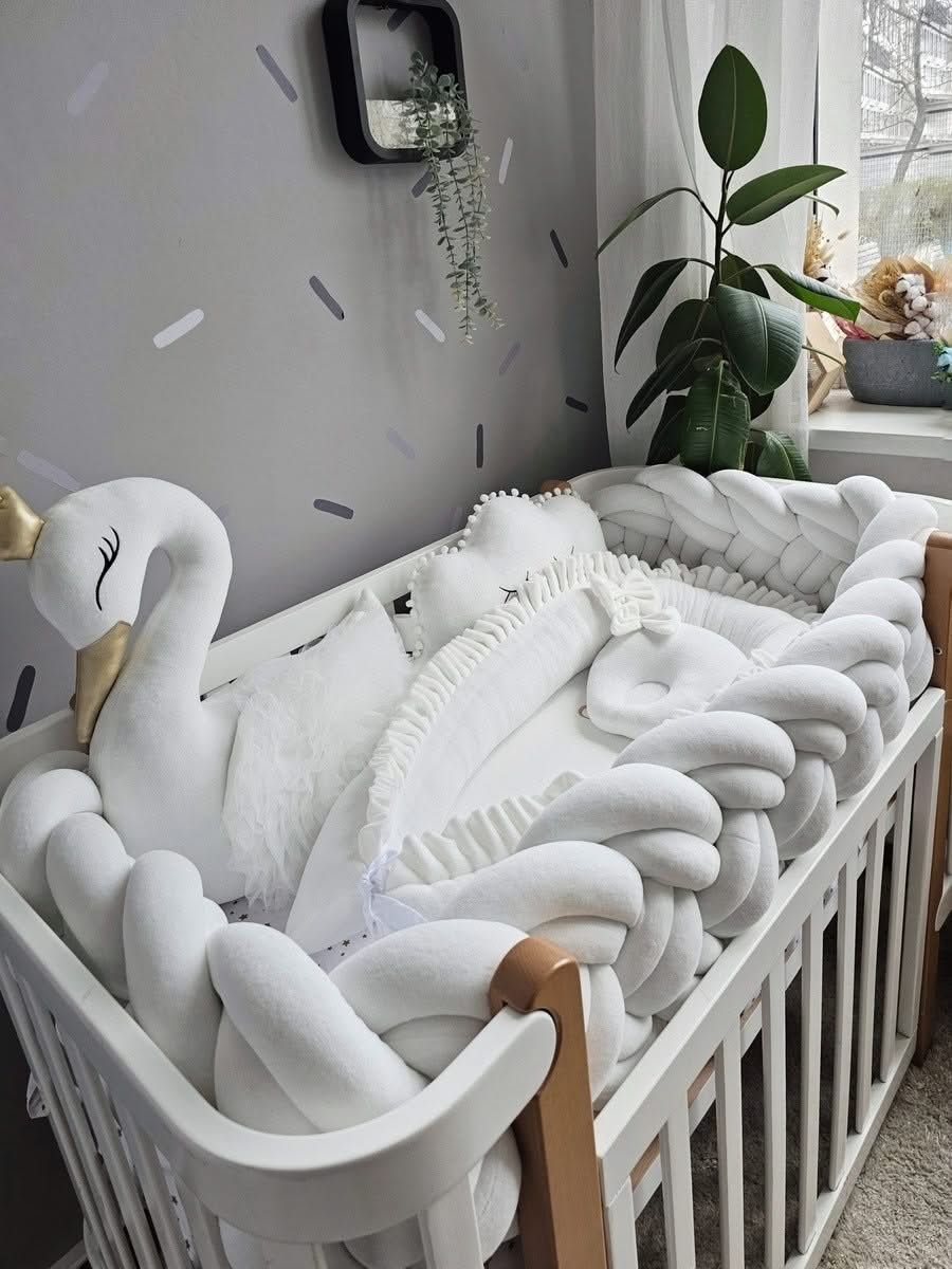 Premium creamy baby crib bedding set with braided crib bumper. KARI studio