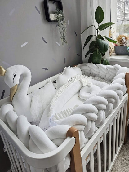 Premium creamy baby crib bedding set with braided crib bumper. KARI studio