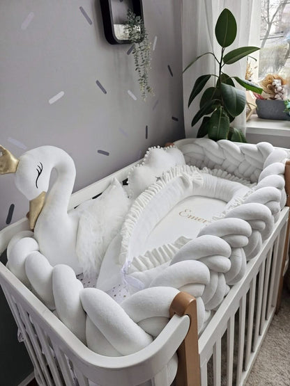 Premium creamy baby crib bedding set with braided crib bumper. KARI studio