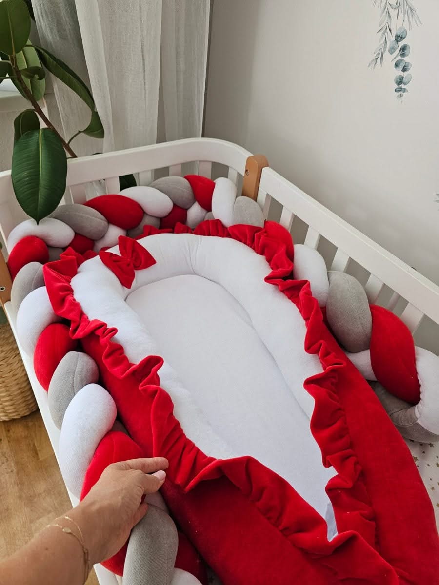 Red baby crib bedding set with braided bumper. KARI studio
